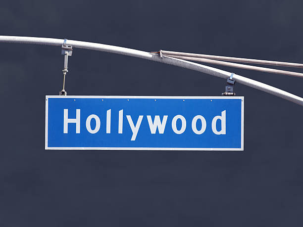 istock Hollywood Blvd Overhead Street Sign with Dark Storm 454132949