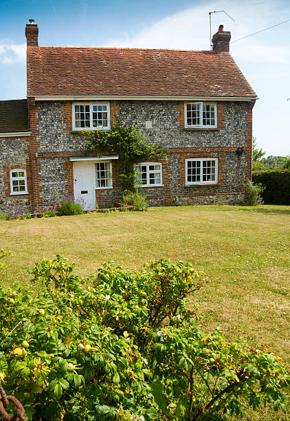 istock Cottage and lawn 454135951