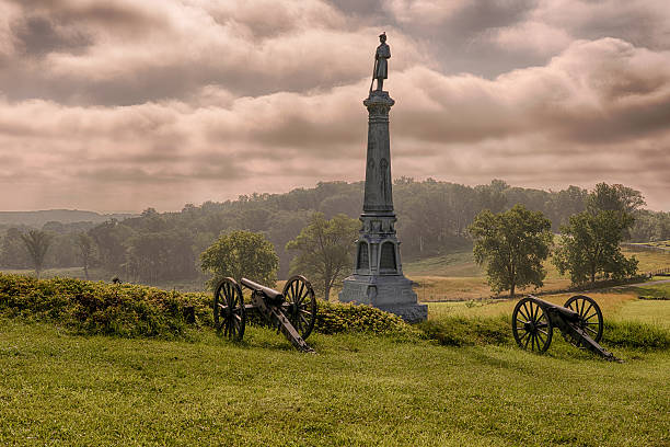 Ohio's Tribute Ohio's Tribute monument to Carroll's Brigade on East Cemetery Hill. This marks the spot where the 4th Ohio Infantry repelled an attack of the Confederate army. Photo captured near the entranced to the Evergreen Cemetery in Gettysburg, Pennsylvania battlefield photos stock pictures, royalty-free photos & images