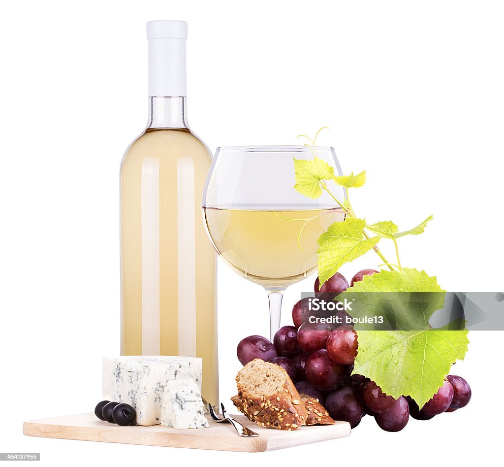 Vino blanco variedad de quesos y uvas - Foto de stock de Agricultura libre de derechos