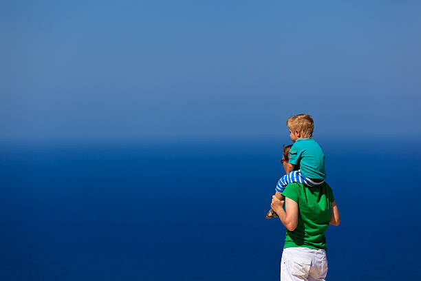 istock father and son on sea vacation 454137967