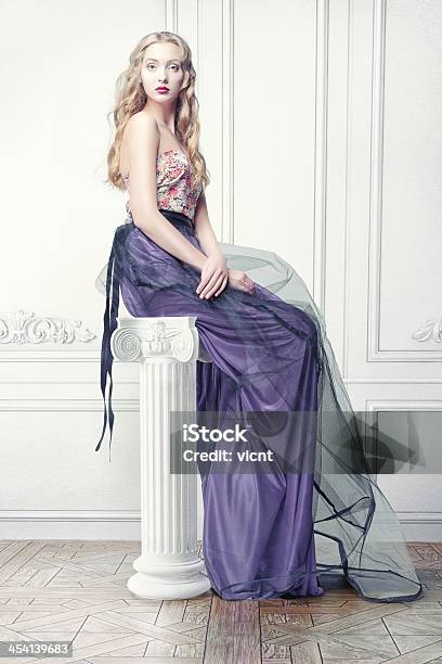 Woman In Luxury Interior Stock Photo - Download Image Now - Pedestal, Architectural Column, Sitting