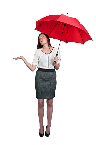 istock Woman Holding Umbrella 454142795