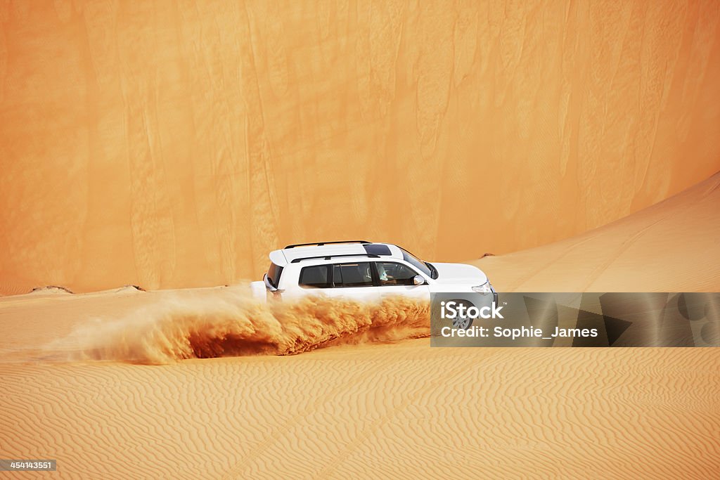 4x4 dune bashing is a popular sport of Arabian desert 4x4 dune bashing is a popular sport of the Arabian desert Desert Area Stock Photo