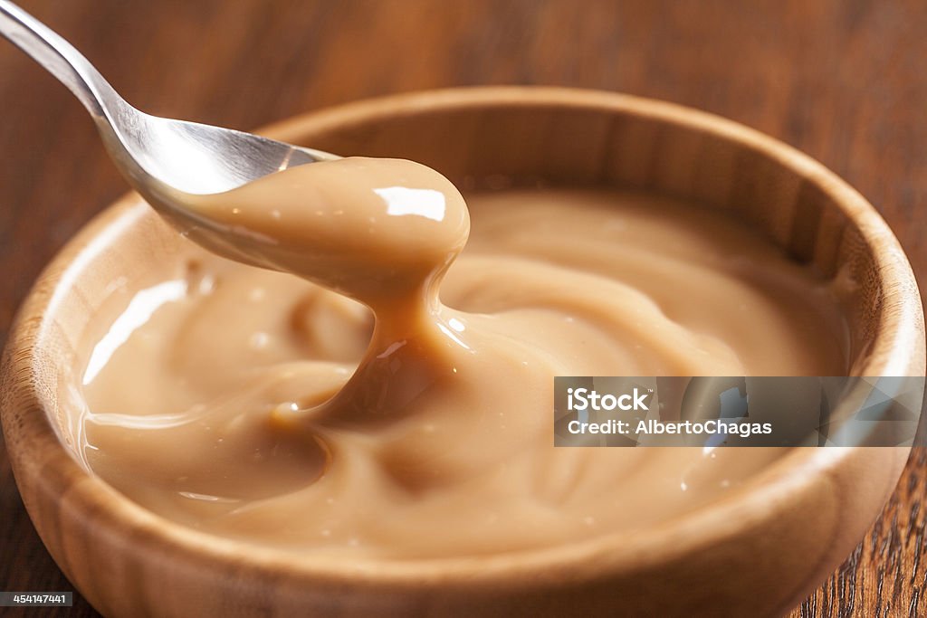 milk caramel Dulce de leche,(Doce de leite) a sweet made ââfrom milk, made in Brazil and Argentina. Dulce De Leche Stock Photo