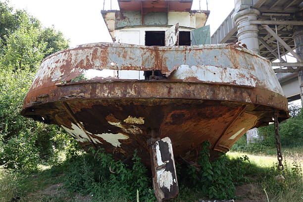 istock abandoned and beached car ferry left to rot under bridge 454151971