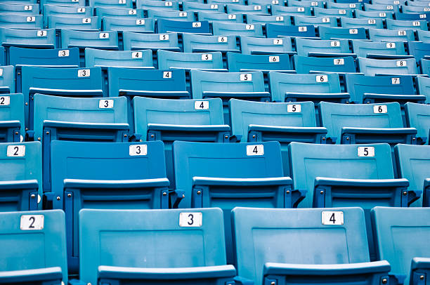 istock row of blue seats in a stadium 454153293