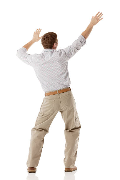 istock Rear view of a man dancing 454153645