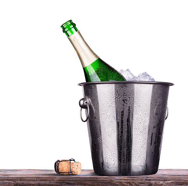istock bottle of champagne in ice bucket 454154355