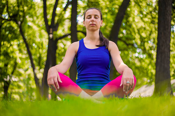 istock Girl practicing yoga and meditation 454155113