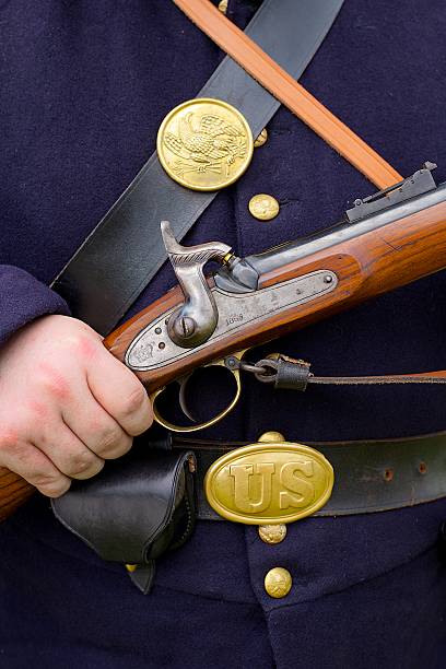 istock Civil War Reenactor Holds his Musket 454156545