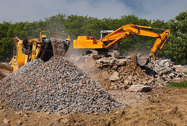 Stone crusher and crane stock photo