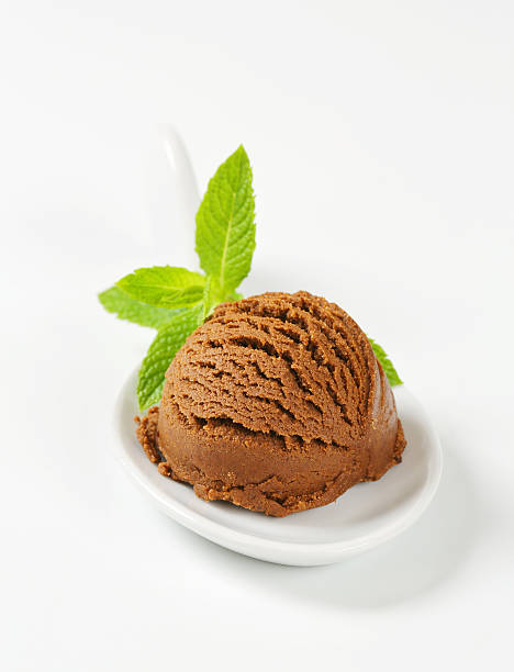 istock Scoop of chocolate ice cream in a plastic spoon 454169521