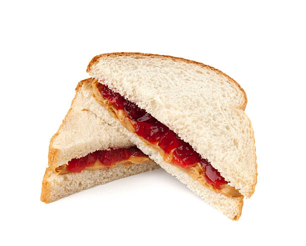 ピーナッツバターとゼリーのサンドイッチ - ジャム ストックフォトと画像