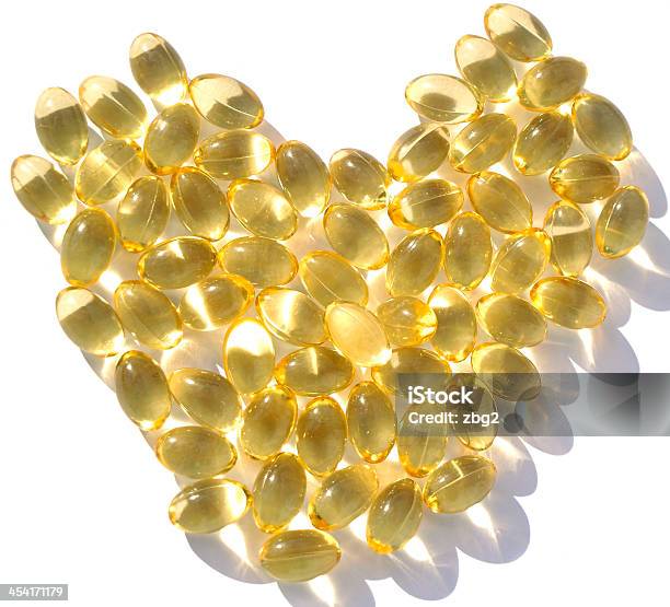 Foto de Omega 3 Cápsulas De Gel e mais fotos de stock de Alimentação Saudável - Alimentação Saudável, Amarelo, Bem-estar