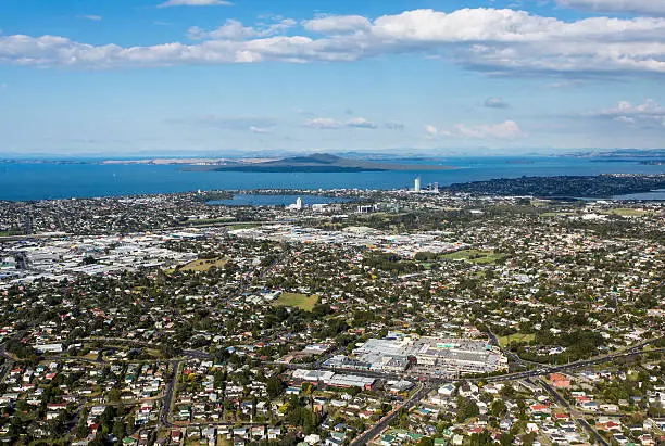 Auckland City and it's northern suburbs from the air with the hauraki gulf and islands in the background