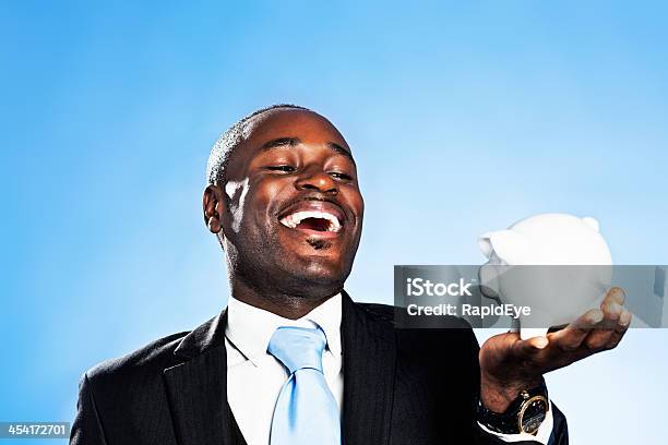 My Savings Plan Is Looking Good Laughing Busnessman With Piggybank Stock Photo - Download Image Now