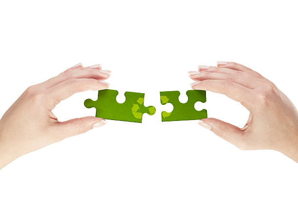 istock Recycle symbol on puzzle peaces 454173465