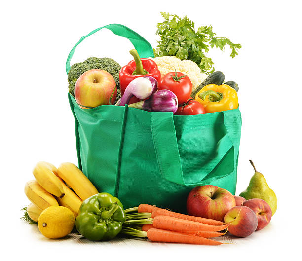 istock Shopping bag with grocery products isolated on white 454175041