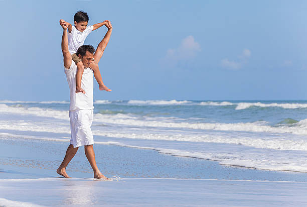 istock Father Parent Boy Child Family Beach Fun 454176085