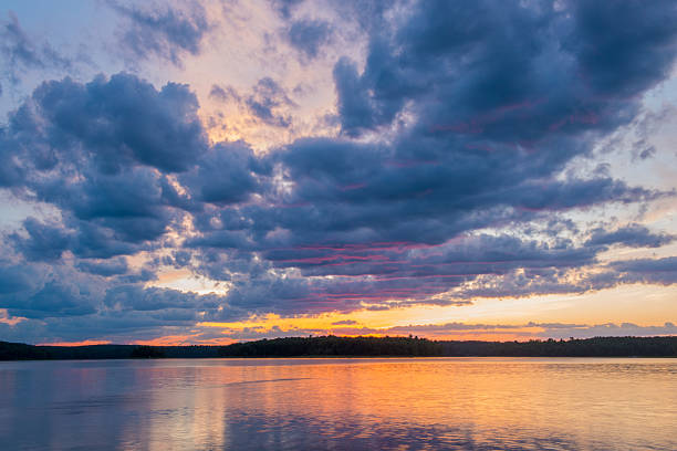 istock Cloudy Sunset over Lake in the Catskill Mountains New York 454177091