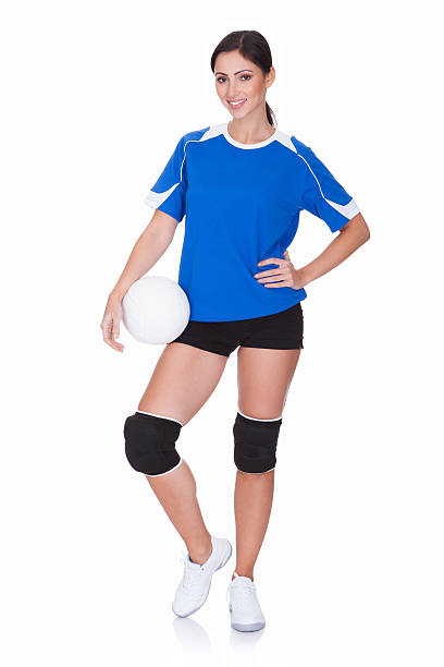 スポーティなボールを持つ女性 - isolated volleyball women adult ストックフォトと画像