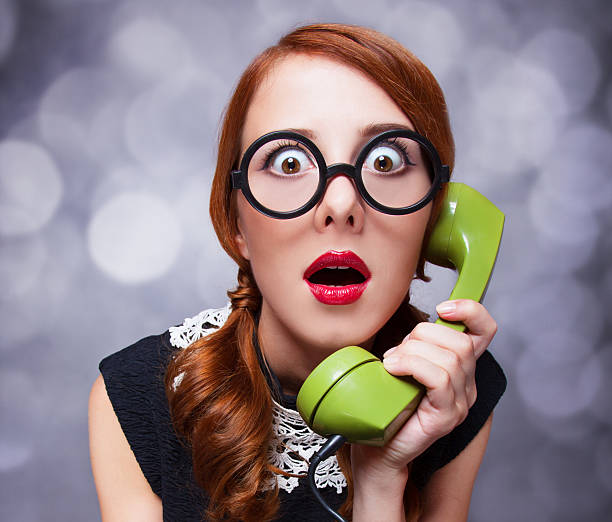 Women with green telephone