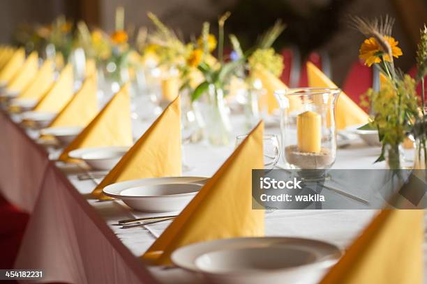 Yellow Table Decoration Stock Photo - Download Image Now - Dining Table, Long, Candlelight