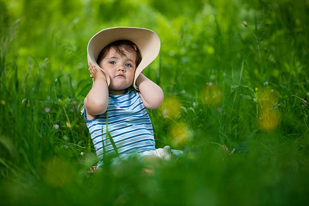istock sweet girl in grass 454183775