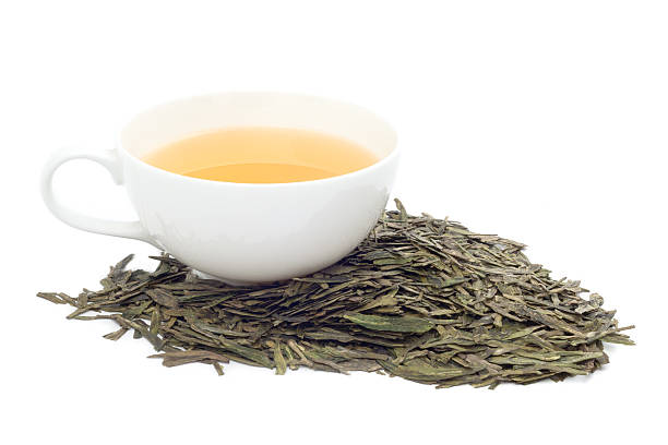 istock Cup of green tea on white background 454191791