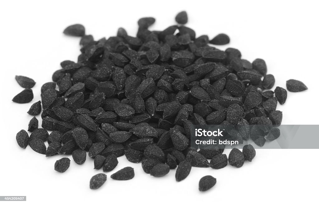 Nigella or Black cumin Nigella or Black cumin over white background Asia Stock Photo