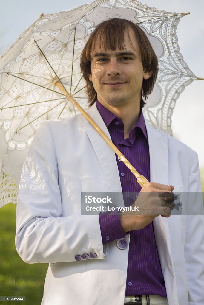 elegant man with umbrella Activity Stock Photo