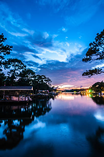 istock Very Colorful Mythical Sunset Over water way 454231479