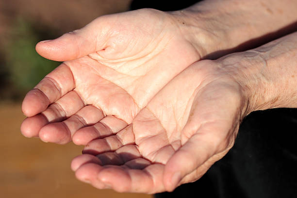 istock palms of an elderly woman 454238703
