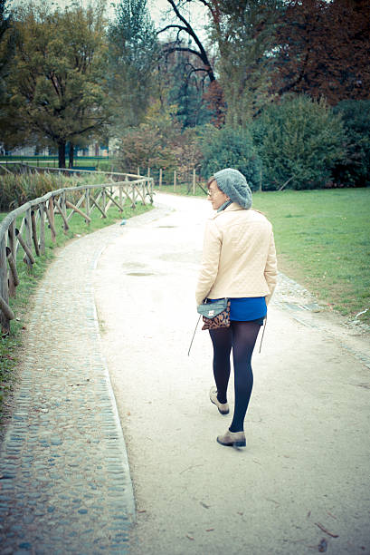 istock young beautiful woman walking 454240713