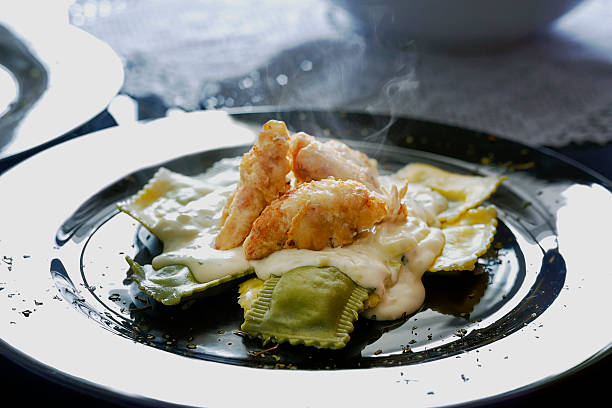 istock pasta and fried chicken with white sauce 454243987