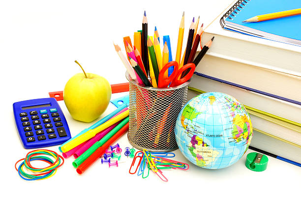 istock Collection of school supplies over white 454244419