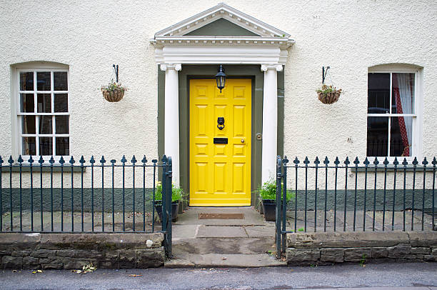 istock House with yellow door 454244553