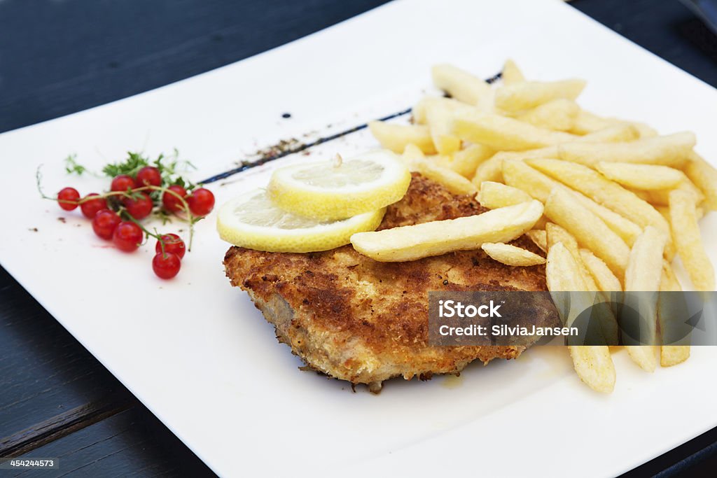 Schnitzel und Pommes frites - Lizenzfrei Beige Stock-Foto