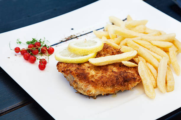 istock Schnitzel and french fries 454244573
