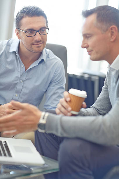 istock Going through the details of corporate planning... 454251089