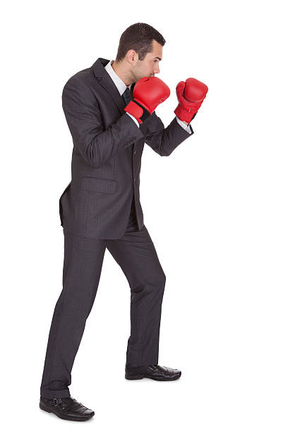 istock Competitive businessman in boxing gloves 454254847