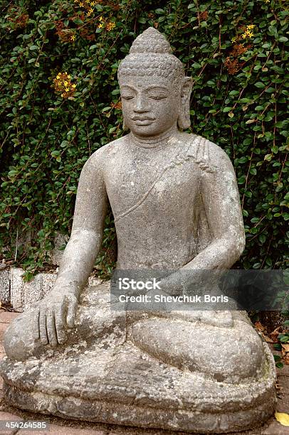 Stone Buddha In The Lotus Position Stock Photo - Download Image Now - Adult, Antiquities, Asia