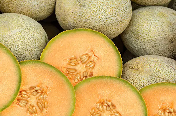 Cantaloupe melon pieces on a weekly fruit market