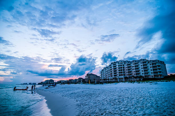 istock sunset on florida beach with white sand and blue sky 454267167