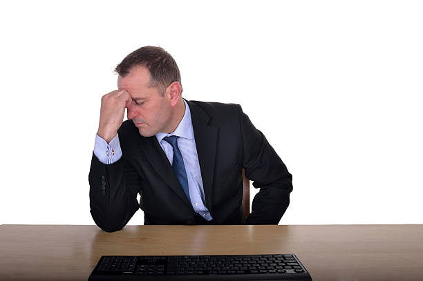 Depression at work stock photo