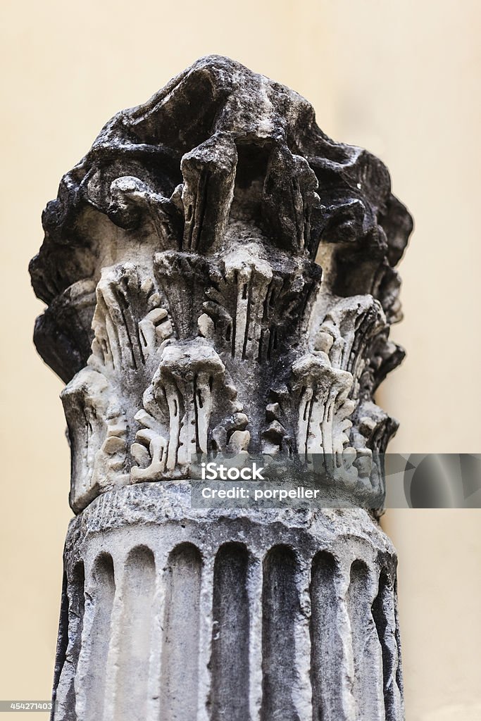 Doric column an ancient classical column ruined by time and weather Aging Process Stock Photo