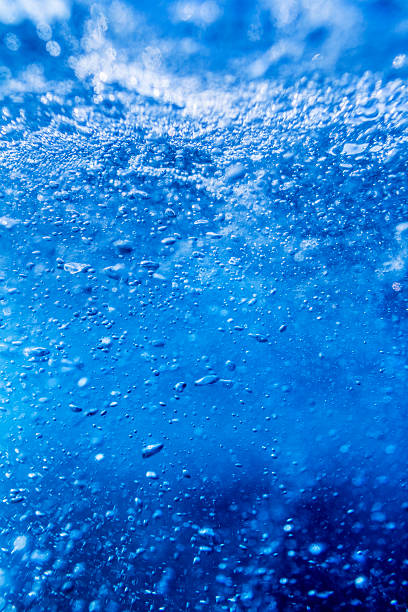 istock Underwater shot of splashing air bubbles 454276789