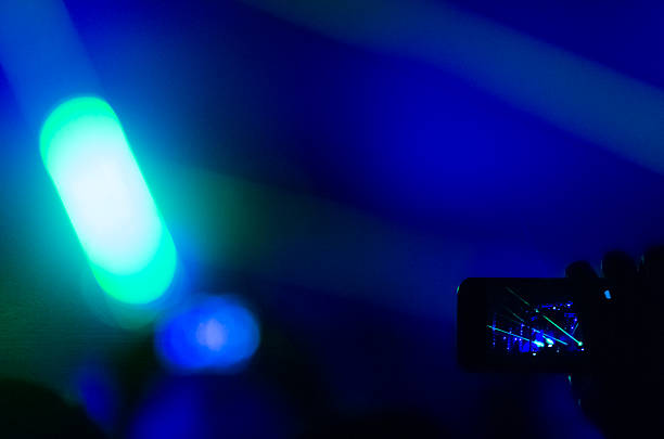 istock Taking photo at concert 454282387