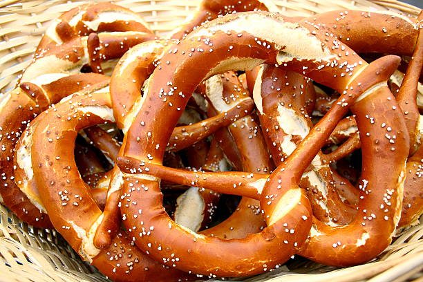 istock Large wicker basket and giant pretzels, close up 454282997